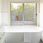 26a.--Main-bedroom-ensuite-bathroom.--Bath-and-separate-walk-in-shower